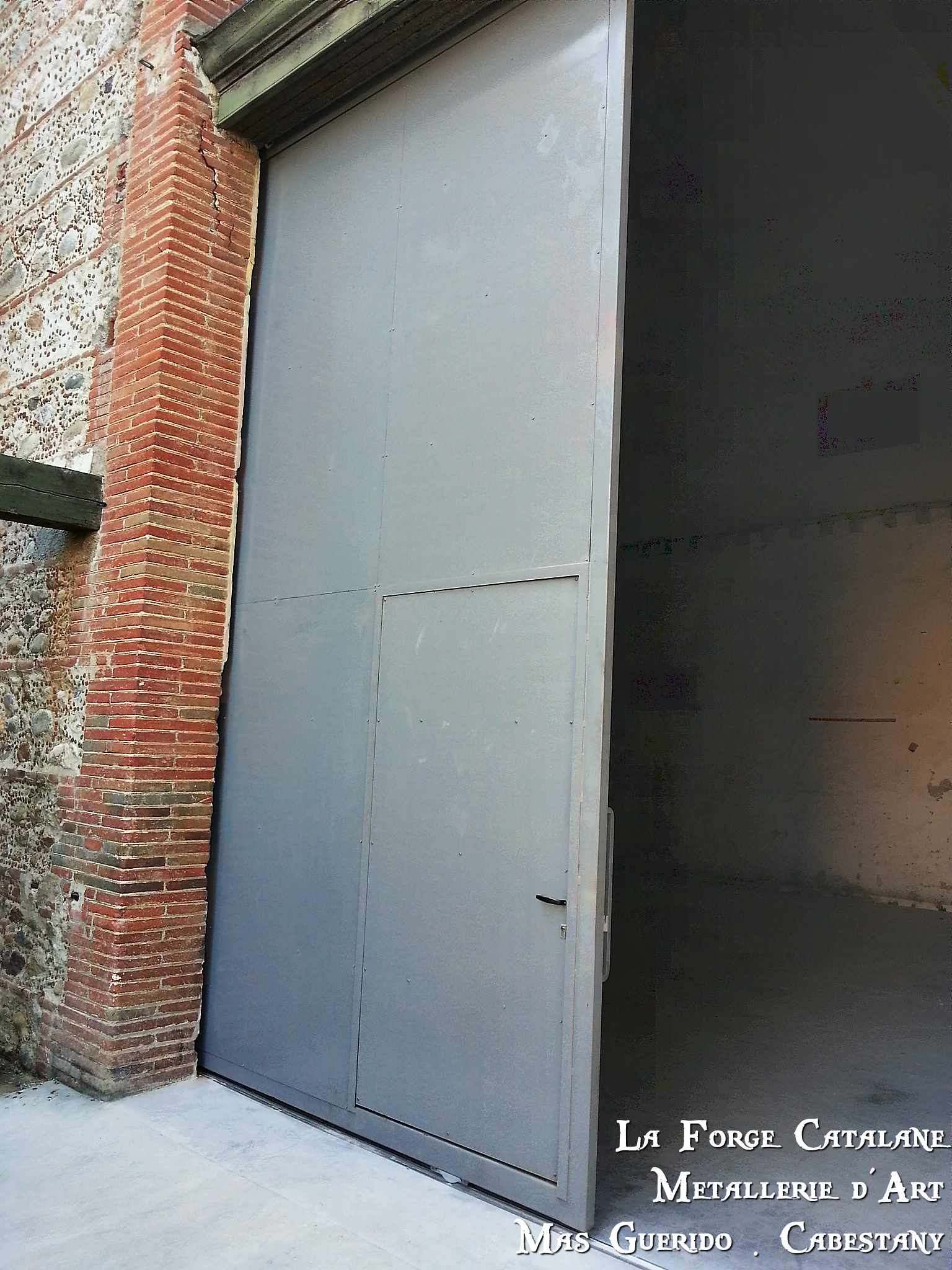 porte coulissante tolee hangar agricole.jpg